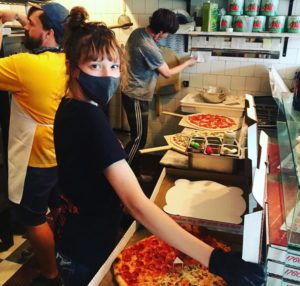 O Sole Mio Pizza building a pie - Vashon Island Washington